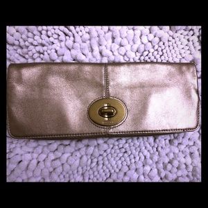 Gold coach clutch